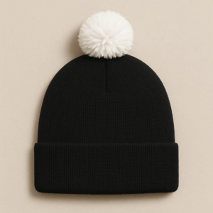Black beanie with a folded cuff and pom